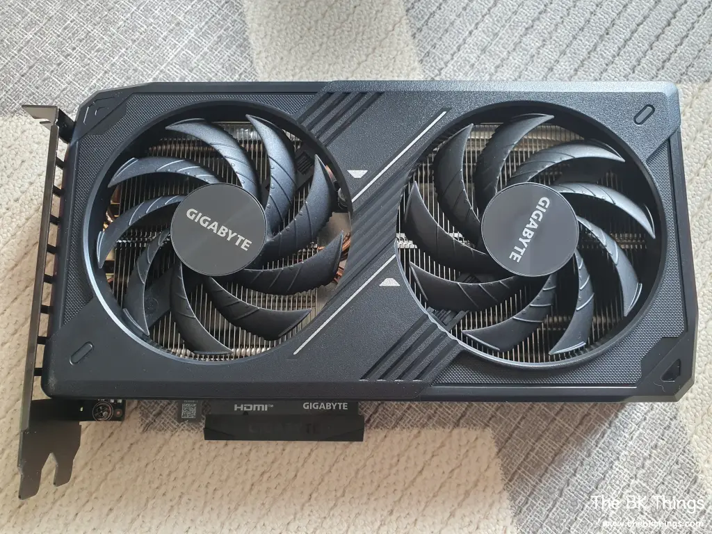 A side-by-side comparison of the Gigabyte RTX 5060 Windforce D7 and the previous RTX 3050 graphics card, highlighting the upgrade for QHD gaming and DLSS 4 performance