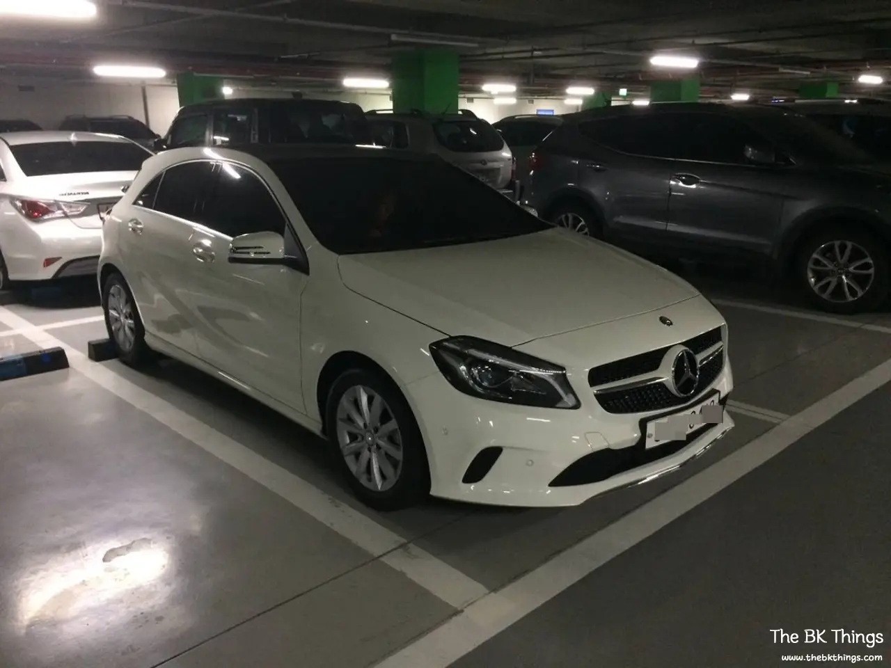 White 2016 Mercedes-Benz A200 (W176) hatchback parked in an underground garage